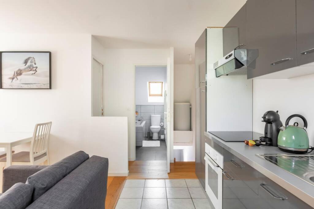 Grand Confort, Appartement Osny Exterior foto